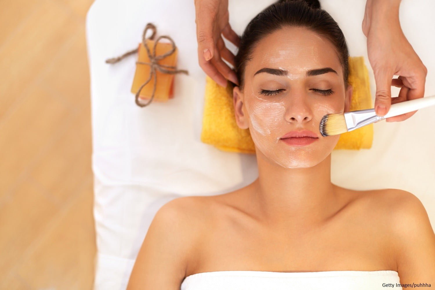 Woman in spa gets a facial during her mother-daughter getaway at HideAway