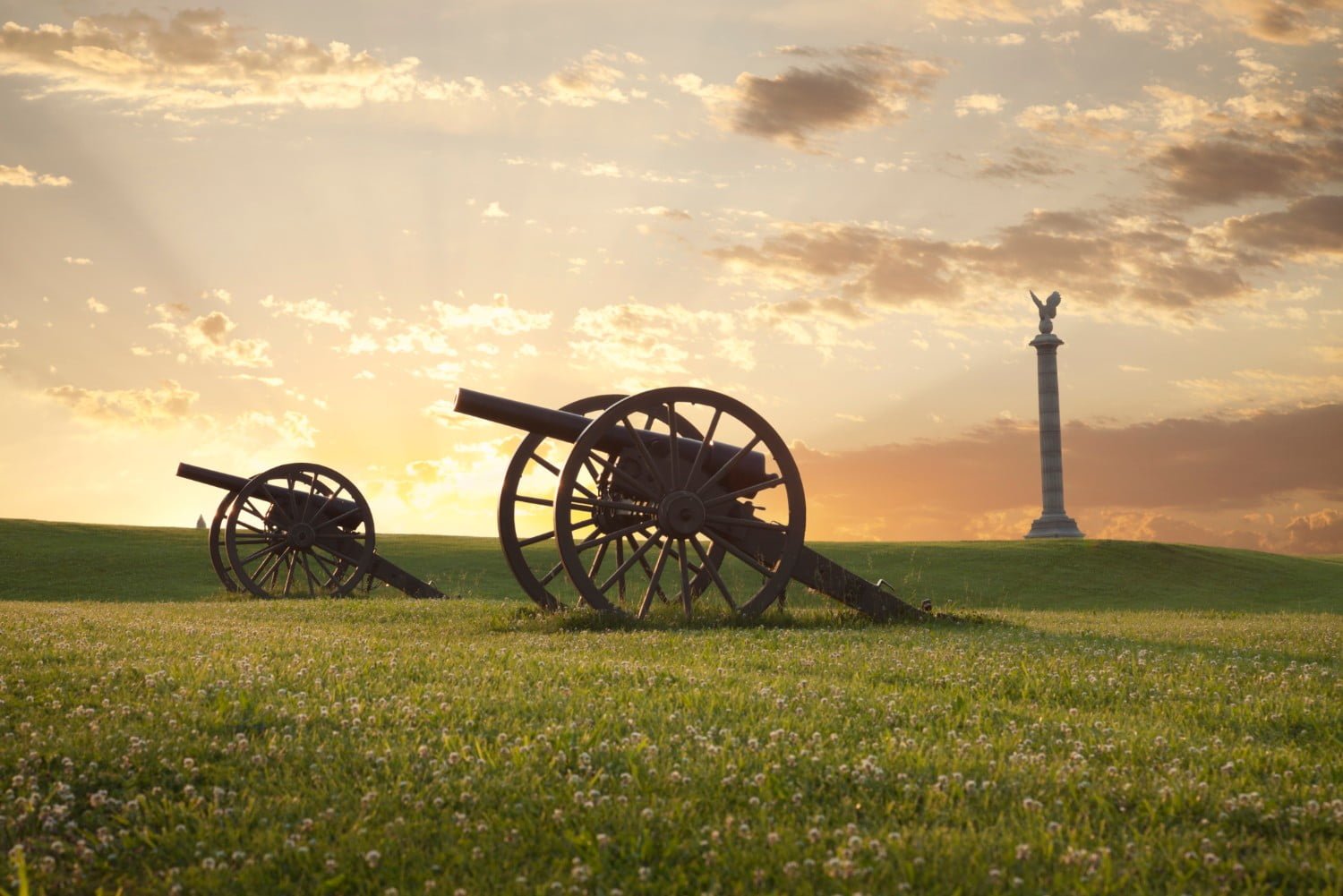 Sunset behind Civil War canons
