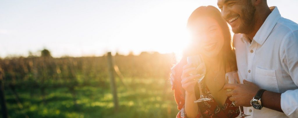 couple enjoying one of the best vineyards in ohio
