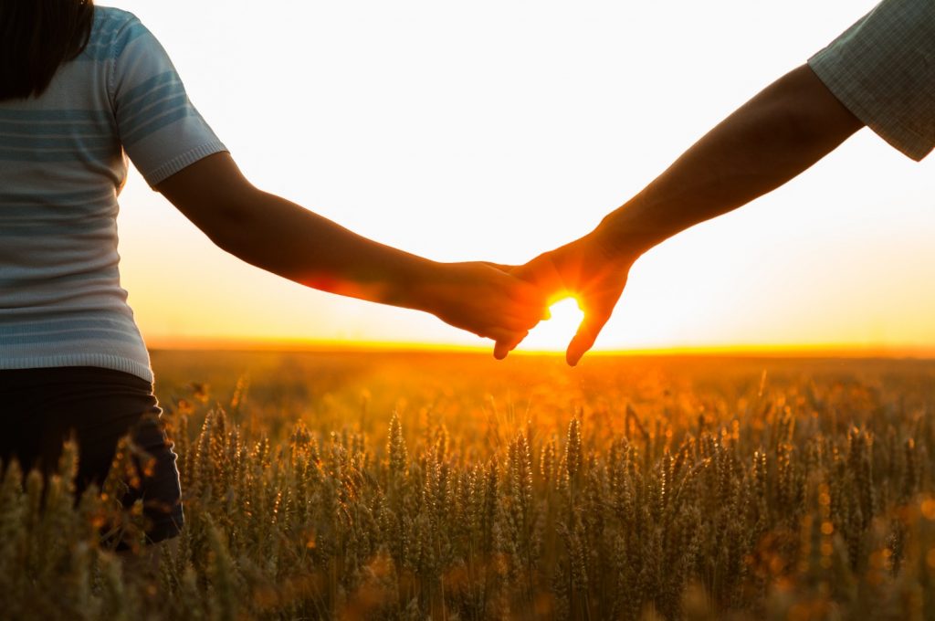 couple holding hands