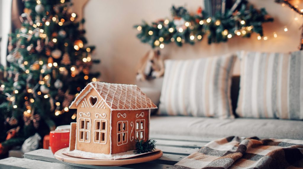 Homemade gingerbread house on light room background to awake holiday spirit and christmas attractions in Ohio