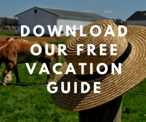 hideaway inn vacation guide button with background of a straw hat and farm