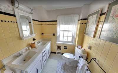 View of the Bathroom at the Garden Manor House Room at the Hideaway Inn